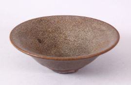 A CHINESE CIRCULAR TEA BOWL, with brown textured glaze, 13.5cm.