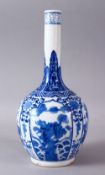 A CHINESE KANGXI STYLE BLUE & WHITE PORCELAIN BOTTLE VASE, with panel decoration of lion dogs and