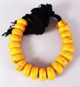 A LARGE SET OF TURKISH? PRESSED AMBER BEAD NECKLACE, 20 beads, each bead approx. 5cm, overall
