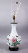 A CHINESE REPUBLIC STYLE FAMILLE ROSE PORCELAIN VASE, decorated with birds amongst native flora,