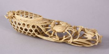 A JAPANESE MEIJI PERIOD CARVED IVORY CRAB GROUP OKIMONO - depicting a basket of crabs with three