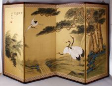 A CHINESE PAINTED SILK TEXTILE FOUR FOLD DIVIDING SCREEN, painted to depict four cranes aside a