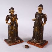TWO PERSIAN LACQUERED WOOD FIGURES, (AF), 18.5cm high.