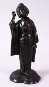A 19TH CENTURY JAPANESE BRONZE FIGURE OF A GIRL HOLDING A MUSICAL INSTRUMENT, 32cm high.