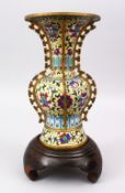A FINE QUALITY 20TH CENTURY CHINESE CLOISONNE VASE, the vase with a pale yellow ground with formal