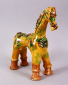 A GOOD TURKISH CANNAKKALE POTTERY FIGURE OF A HORSE - OIL POURER, modeled as a stylized horse,