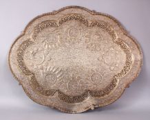 A LARGE AND HEAVY 19TH CENTURY INDIAN SILVERED METAL RELIEF TRAY - FISH , decorated with raised