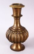 AN INDIAN BRONZE RIBBED BODY HUQQA BASE, with a ribbed body decoration, 22cm.