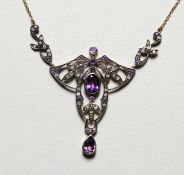 A 9CT GOLD AND SILVER, AMETHYST AND DIAMOND NECKLACE.