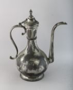 A TINNED COPPER ISLAMIC EWER. 14ins high.