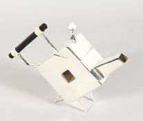 A CHRISTOPHER DRESSER DESIGN DIAMOND TEAPOT.