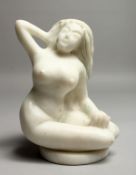 A GOOD CARVED WHITE MARBLE SEATED NUDE. 7ins high.