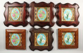 SIX MINTON MAJOLICA SQUARE TILES. 7ins x 7ins, four in one type of frame, the other two different.