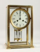 A GOOD FRENCH BRASS FOUR GLASS CLOCK, AI No. 39269, with mercury pendulum. 11ins high.