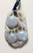 A PIERCED LAVENDER JADE PENDANT.