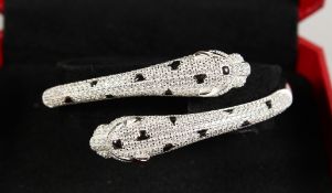 A GOOD SILVER .925 PANTHER BANGLE.