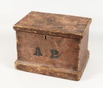 A 19TH CENTURY PINE BOX with hinged lid, the front with initials A.B. 13ins wide.