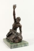 A BRONZE MALE NUDE WITH ARM RAISED on a marble base. 13ins high.