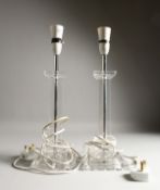 A PAIR OF PERSPEX SQUARE ELECTRIC LAMP BASES. 16ins high.