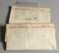 TWO BAGS OF WHITE ZIRCONS.