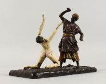 A GOOD AUSTRIAN PAINTED COLD CAST GROUP, an Arab and a young lady. 7ins long. No. 8059 on base.