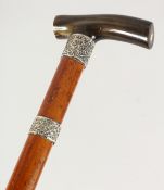 A STRONG EDWARD VII RHINO HANDLED WALKING STICK with two silver bands. London 1903. 3ft long.