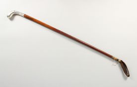 A SILVER HANDLED RIDING CROP. 2ft 7ins long.