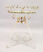 A WHITE PAINTED WIRE CIRCULAR PLANT STAND. 2ft 4ins high x 2ft diameter.