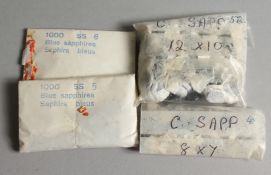 FOUR BAGS OF BLUE SAPPHIRES.