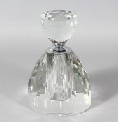 A HEAVY FACET CUT CIRCULAR SCENT BOTTLE AND STOPPER. 9ins high.