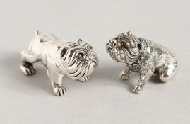 TWO MINIATURE CAST SILVER DOGS.