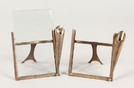A PAIR OF VICTORIAN SILVER EASEL PHOTOGRAPH FRAMES. Chester 1898.
