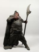 A GOOD LARGE BRONZE FIGURE OF A WARRIOR, holding a naginata in his left hand. 30ins high.