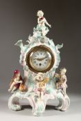 A GOOD DRESDEN PORCELAIN MANTLE CLOCK, with four putti depicting the seasons, the drum movement with
