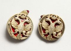 A PAIR OF RUSSIAN SILVER GILT IMPERIAL EAGLE CUFFLINKS with Faberge mark.