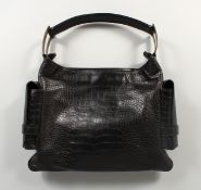 A VERSACE BLACK SIMULATED CROCODILE SKIN TOTE BAG with printed key pattern lining, in black cloth