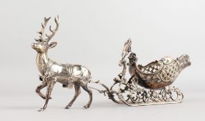 A CONTINENTAL .925 SILVER STAG PULLING A SLEIGH. Weight: 10ozs.