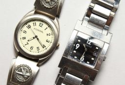 A GENTLEMAN'S GUCCI STAINLESS STEEL WATCH and A FOSSIL WATCH.