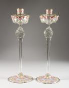A GOOD PAIR OF VENETIAN ENAMEL DECORATED GLASS CANDLESTICKS. 13ins high.