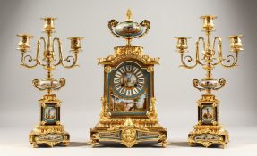 A SUPERB 19TH CENTURY FRENCH GILT BRONZE AND PORCELAIN THREE-PIECE CLOCK GARNITURE, the clock with
