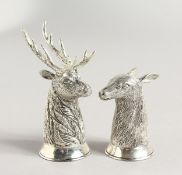 A PAIR OF .925 SILVER PLATE DEER AND STAG SALT AND PEPPERS. 2.5ins high.