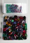 A BOX OF SEMI-PRECIOUS STONES.