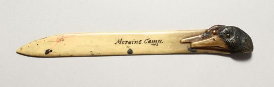 A MORAINE CAMP CARVED DUCKS HEAD PAPER KNIFE. 19.5cm