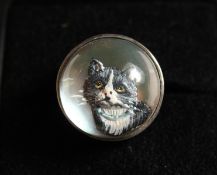 A SILVER ESSEX CRYSTAL CAT RING.