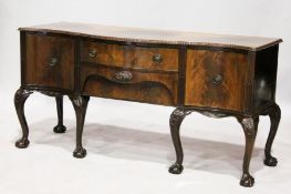 A GEORGIAN STYLE MAHOGANY SIDEBOARD, with two central drawers flanked by a cellarette drawer, on