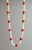 A 14K GOLD, CORAL AND PEARL NECKLACE.