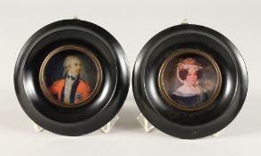 A PAIR OF CIRCULAR PORTRAIT MINIATURE PRINTS. Frames 13cm diameter.