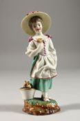 A GOOD 19TH CENTURY HOCHST PORCELAIN FIGURE OF A YOUNG GIRL holding a flower, wearing a large hat.