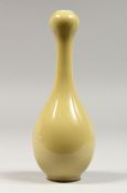 A SMALL CHINESE YELLOW GROUND ONION NECK VASE. 6.5ins high.