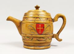 A FRENCH PAINTED MAHOGANY TEAPOT SHAPED TEA CADDY with crests. 5.5ins high.